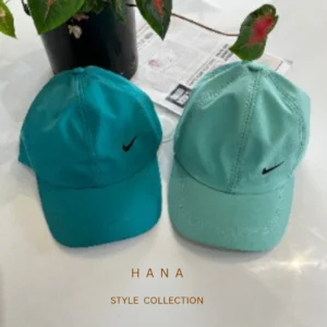 کلاه شمعی نایک در دو رنگ سبز پاستیلی و سبزآّبی- لباس دخترانه