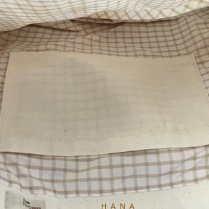 توت بگ متقال روشن با طرح گل نرگس مناسب استایل مینیمال با جزییات آستر و جیب- لباس دخترانه