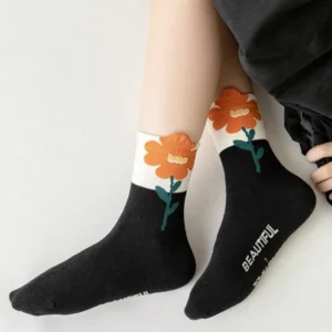 تنخور جوراب نیم ساق گلدار زنانه مشکی با گل نارنجی، اکسسوری دخترانه