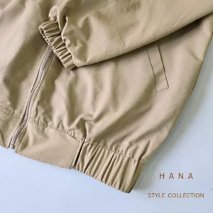 بامبر دخترانه جنس کتان زارا رنگ کرم از نمای آستین وجیب- لباس زنانه